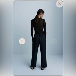Monica Cordera black straight leg denim.